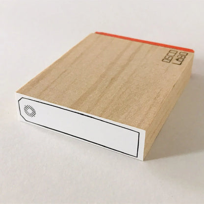 Tampon à ruban adhésif pour cadre 